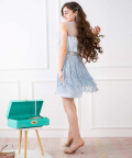 A Stunning Light Blue Dress With Feathers On The Bodice And Tassels On The Skirt