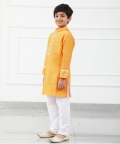Orange Chanderi Kurta With White Chudidar Pyjama