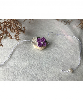 Small Flower Rakhi In Lavender & Silver - 1 Pc