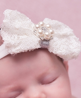 White Sequin Bow Decorated With Sparkly Pearl