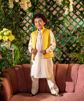 Qanari Embroidered Yellow Nehru Jacket Paired With Cream Kurta & Trouser Set 